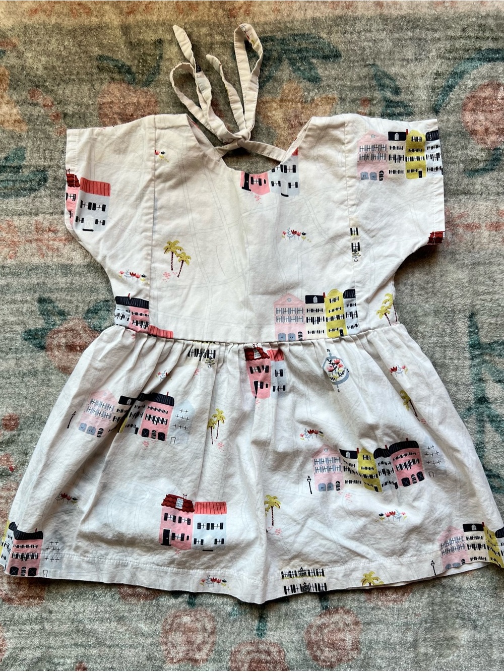Urbane Baby + KidGirls White Charleston Dress with Pink & Yellow Building Print
